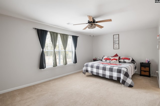 bedroom with visible vents, ceiling fan, baseboards, and carpet floors