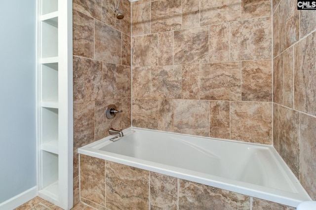 full bath featuring tiled shower / bath combo