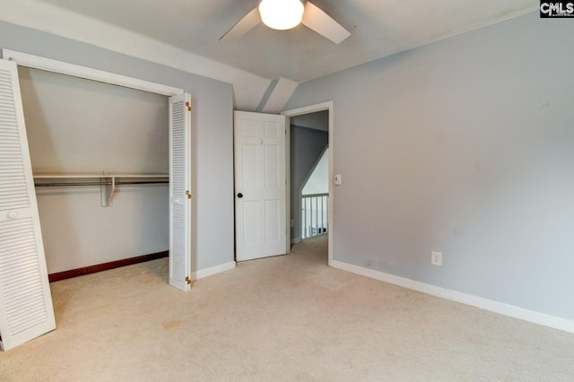 unfurnished bedroom with a closet, baseboards, and carpet floors