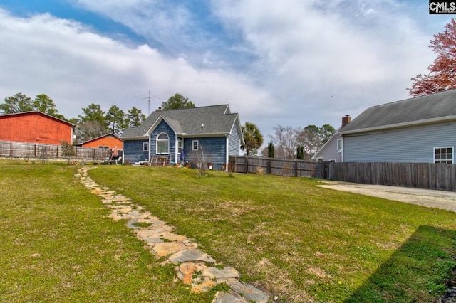 view of yard featuring a fenced backyard