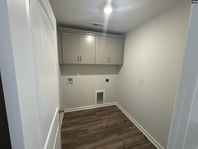 washroom with visible vents, baseboards, hookup for a washing machine, hookup for an electric dryer, and dark wood-style flooring