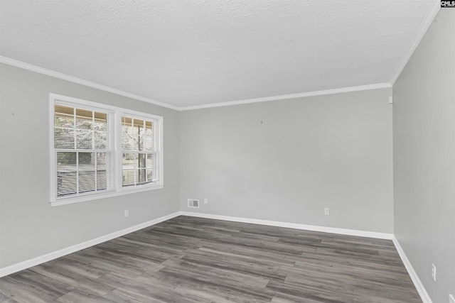 unfurnished room with baseboards, a textured ceiling, wood finished floors, and crown molding