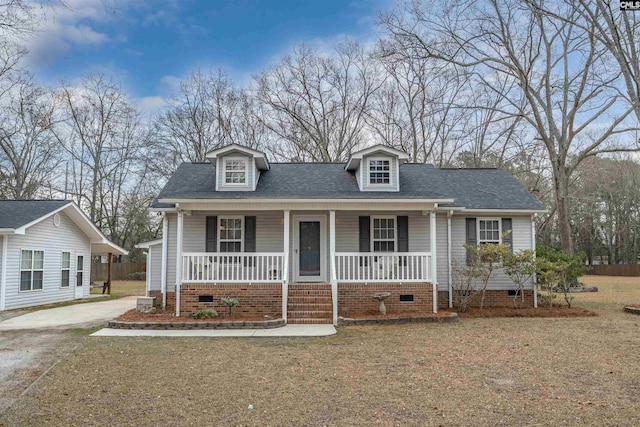 view of front of property featuring crawl space, a porch, and a shingled roof