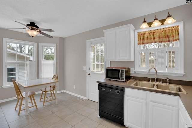 kitchen with white cabinetry, ceiling fan, a sink, dishwasher, and stainless steel microwave