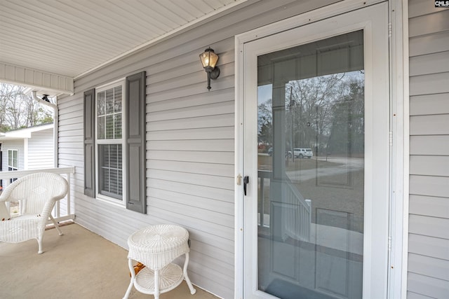 property entrance with a porch