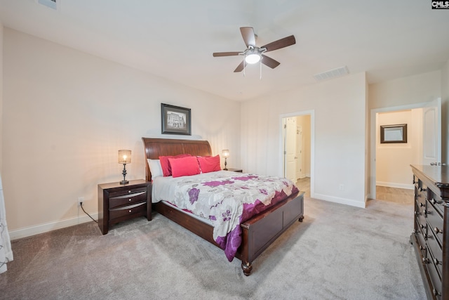 bedroom featuring visible vents, baseboards, carpet, and ceiling fan