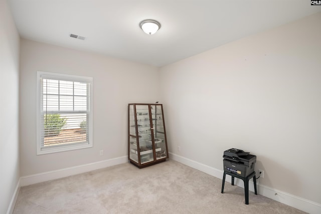 miscellaneous room featuring carpet flooring, baseboards, and visible vents