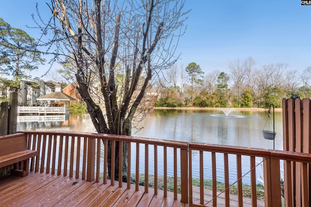 deck featuring a water view