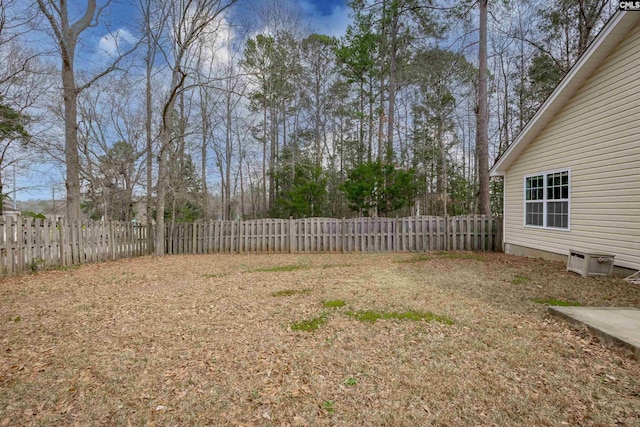 view of yard with a fenced backyard