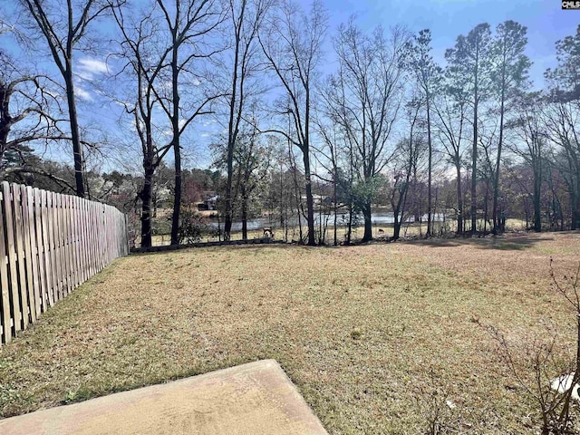 view of yard featuring fence