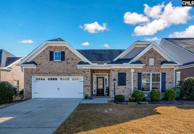 view of front of home with brick siding, board and batten siding, concrete driveway, a front yard, and an attached garage