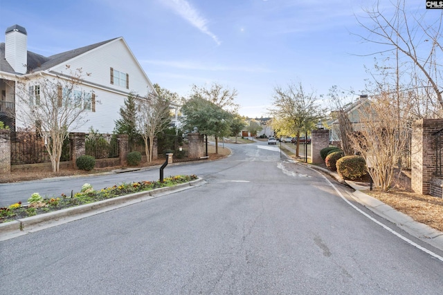 view of road featuring curbs