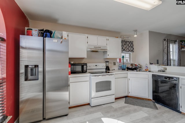 kitchen featuring light wood finished floors, white cabinets, black appliances, and light countertops