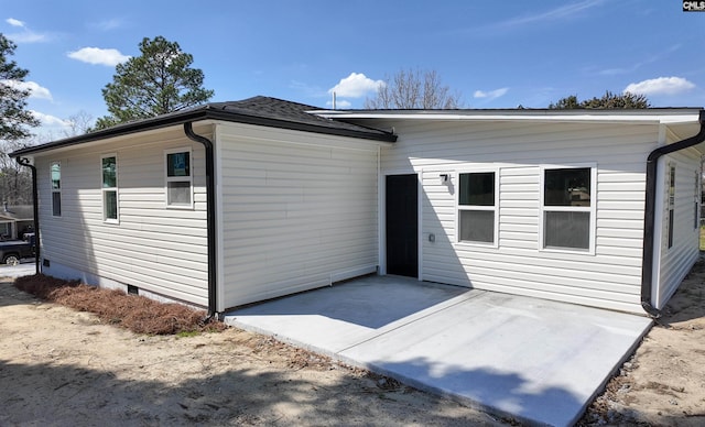 rear view of house with a patio area