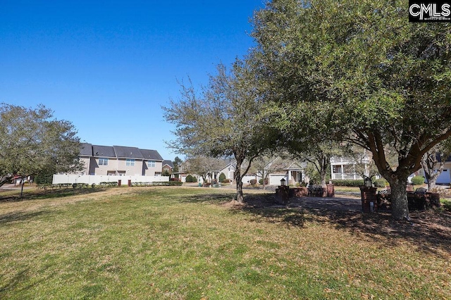 view of yard featuring a residential view