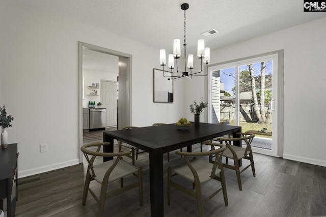 dining room featuring visible vents, baseboards, an inviting chandelier, and dark wood-style flooring