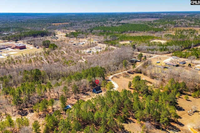 bird's eye view featuring a view of trees