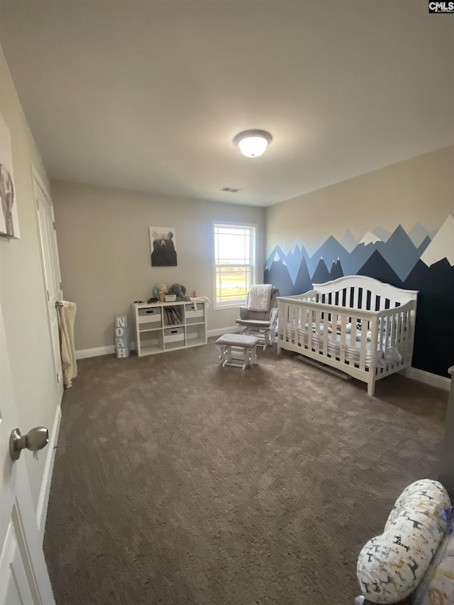 carpeted bedroom featuring visible vents, a nursery area, and baseboards