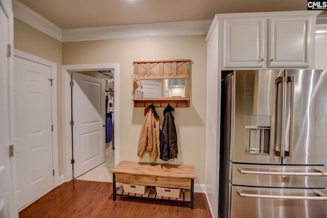 mudroom featuring dark wood-style floors, baseboards, and ornamental molding