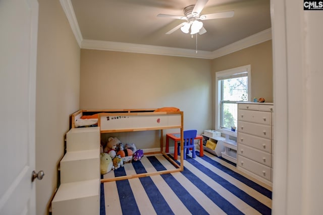 bedroom with baseboards, a ceiling fan, and crown molding