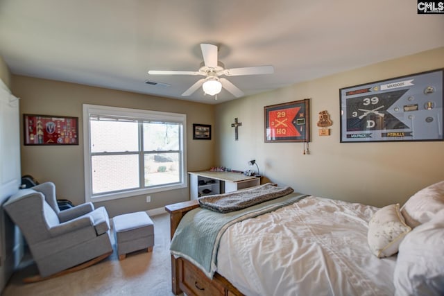 bedroom with a ceiling fan, carpet, visible vents, and baseboards