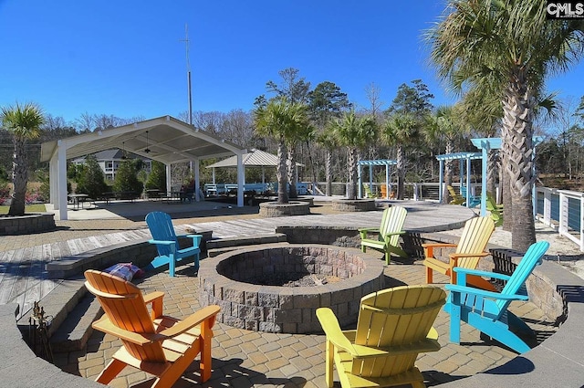 view of patio / terrace featuring a gazebo and a fire pit