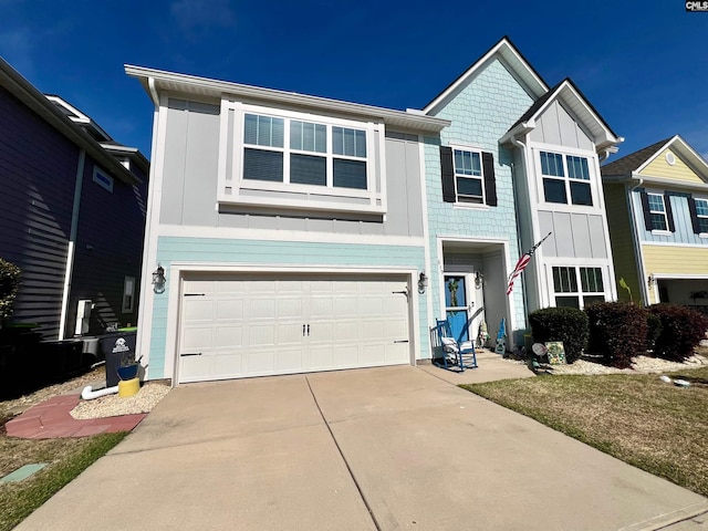 view of front of house featuring a garage, board and batten siding, and concrete driveway