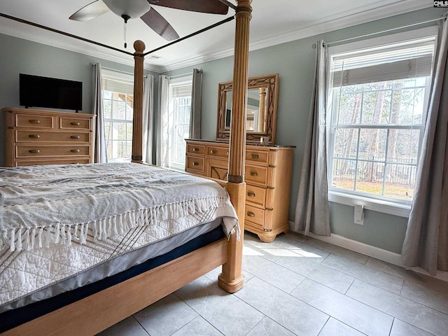 bedroom featuring light tile patterned floors, baseboards, ornamental molding, and a ceiling fan