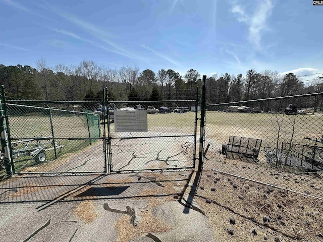 exterior space with fence and a gate