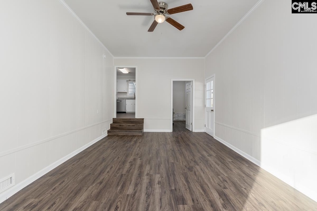 unfurnished living room featuring baseboards, ceiling fan, dark wood finished floors, and ornamental molding