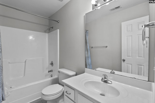 bathroom with visible vents, vanity, toilet, and shower / bath combo with shower curtain