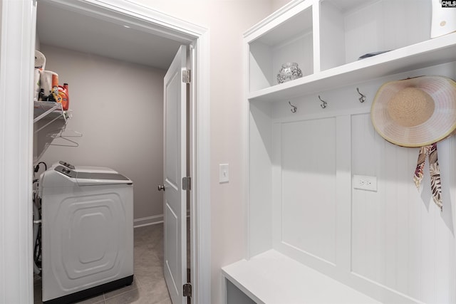 mudroom with light tile patterned flooring and washer / clothes dryer