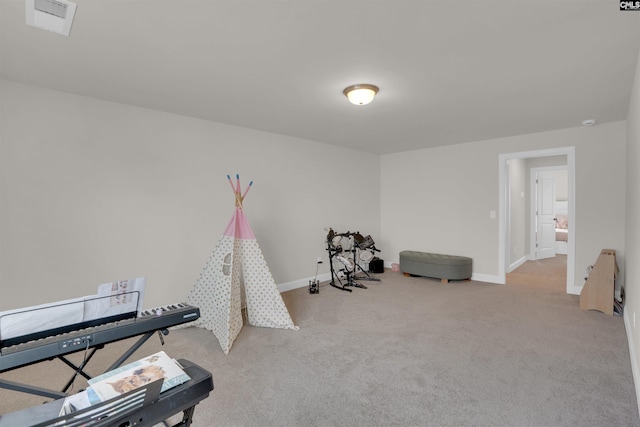 game room with visible vents, baseboards, and carpet flooring