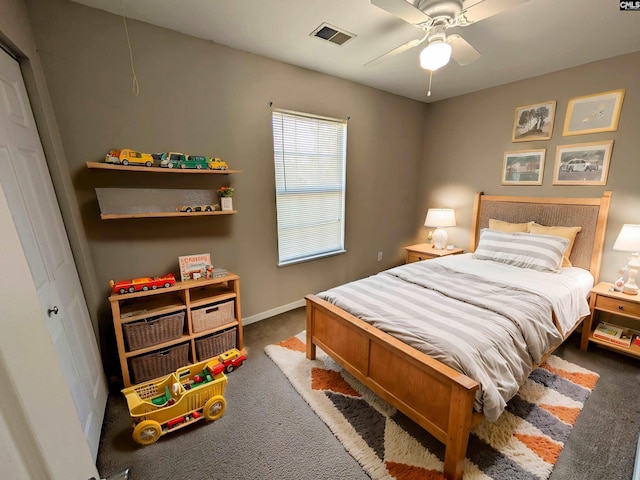 bedroom featuring visible vents, baseboards, ceiling fan, and carpet flooring