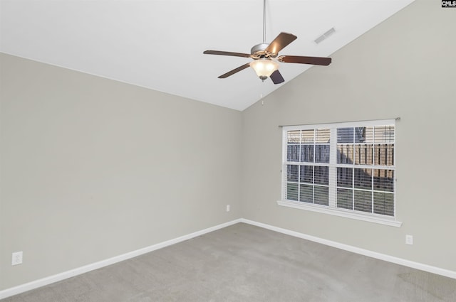 carpeted empty room featuring high vaulted ceiling, a ceiling fan, visible vents, and baseboards