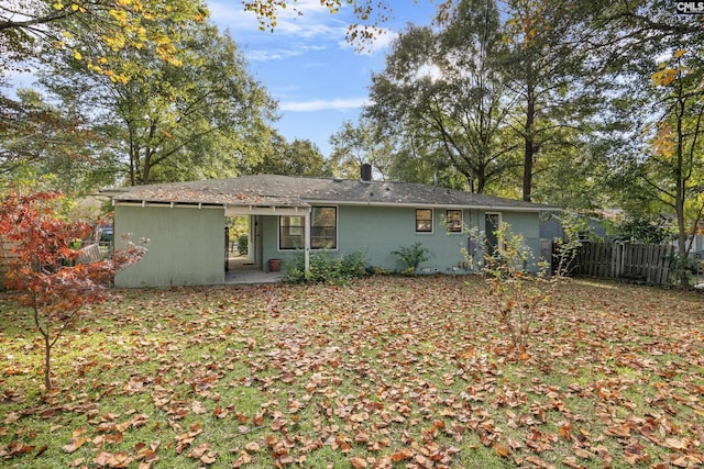 exterior space with a patio area and fence