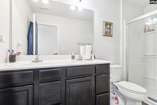 full bath with a sink, visible vents, toilet, and a shower stall