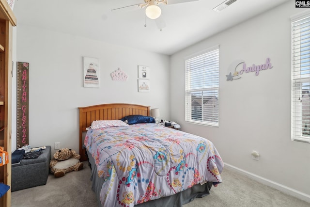 bedroom with visible vents, carpet flooring, a ceiling fan, and baseboards