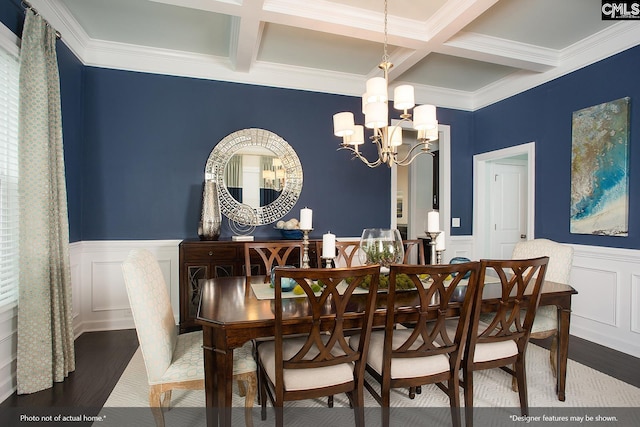 dining space with beamed ceiling, coffered ceiling, an inviting chandelier, and wood finished floors