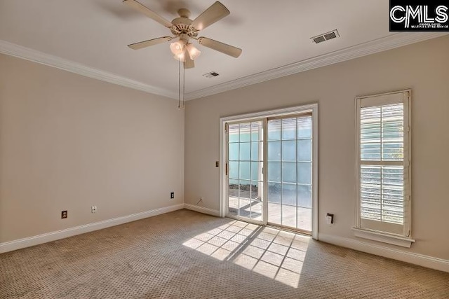 unfurnished room with light carpet, visible vents, baseboards, and ornamental molding