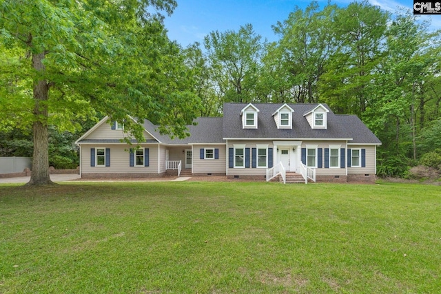 cape cod-style house with a front lawn, roof with shingles, and crawl space