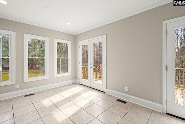 unfurnished sunroom featuring french doors and visible vents