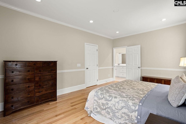 bedroom featuring light wood-type flooring, a sink, recessed lighting, crown molding, and baseboards