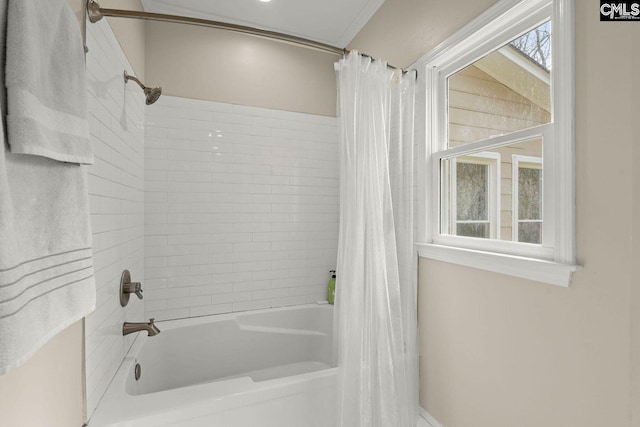 bathroom featuring shower / bathtub combination with curtain