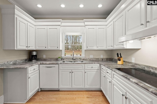 kitchen featuring ornamental molding, a sink, white cabinetry, white dishwasher, and black electric cooktop