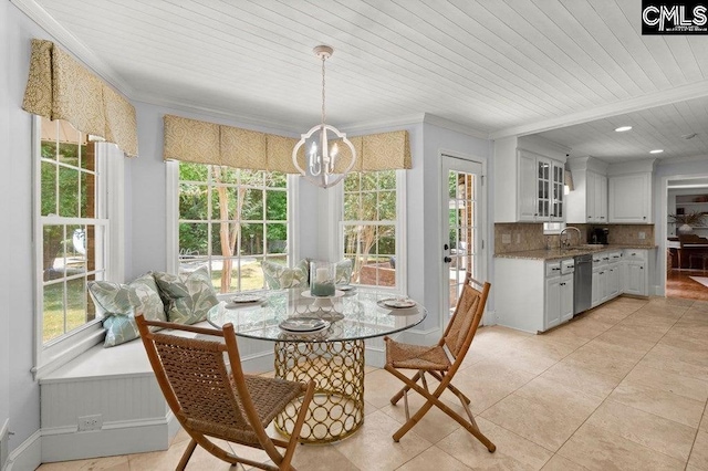 dining space with light tile patterned flooring, wood ceiling, crown molding, and an inviting chandelier