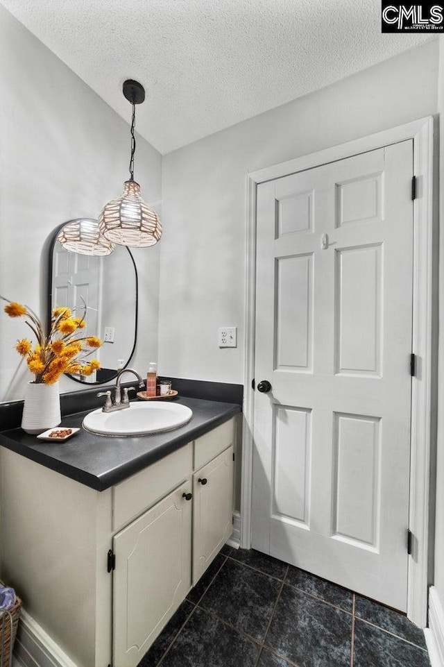 164 Carriageton Dr, Orangeburg, SC 29115 - bathroom with a textured ceiling and vanity