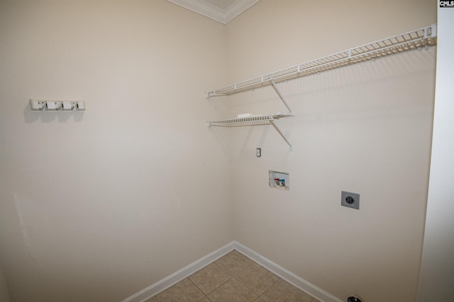 washroom with hookup for a washing machine, light tile patterned floors, baseboards, hookup for an electric dryer, and laundry area