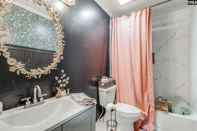 bathroom with vanity, toilet, shower / tub combo with curtain, and ornamental molding