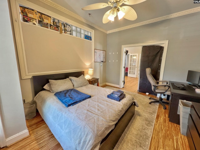 541 Georgia St, Columbia, SC 29201 - bedroom with a ceiling fan, crown molding, wood finished floors, and baseboards